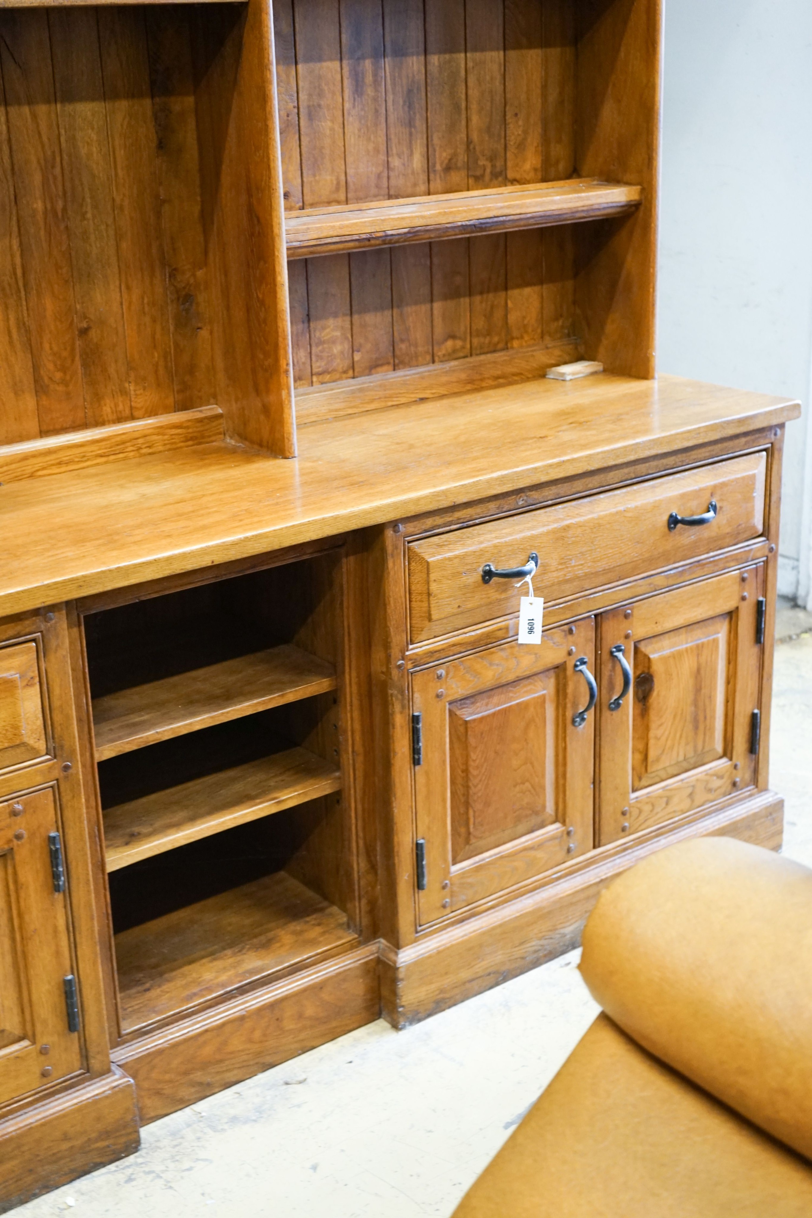 A large reproduction oak dresser, length 210cm, depth 48cm, height 225cm